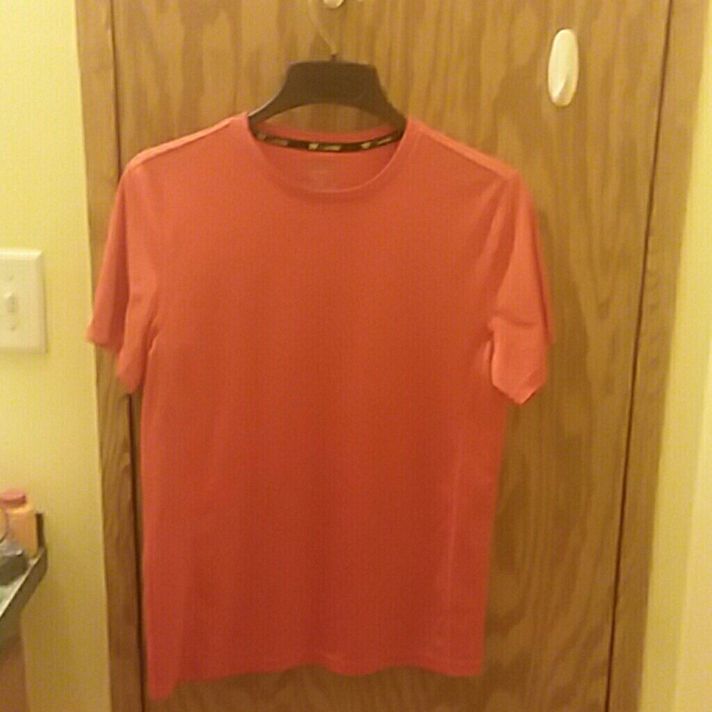 This is a a DryTek SMALL ADULT sports shirt.